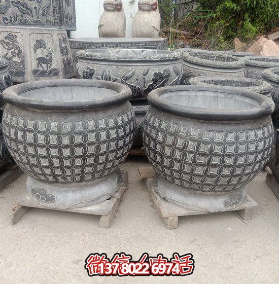 自然美學(xué)結(jié)合青石石雕、浮雕、編織、雕塑的戶外園林魚缸